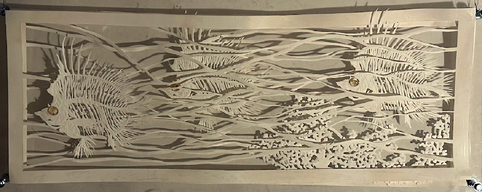 Underwater scene of fish.